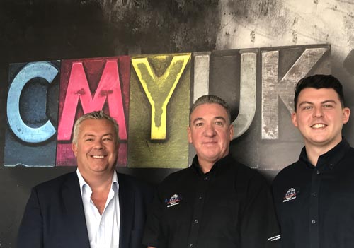 Robin East, MD of CMYUK, with John Gerrard, MD and founder of AE Sewing Machines and Ellis Gerrard, Design and Marketing at AE Sewing Machines.