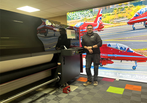 Andrew McCabe from DaftBug Branding Co with an EFI VUTEk Pro 32r UV LED printer from CMYUK