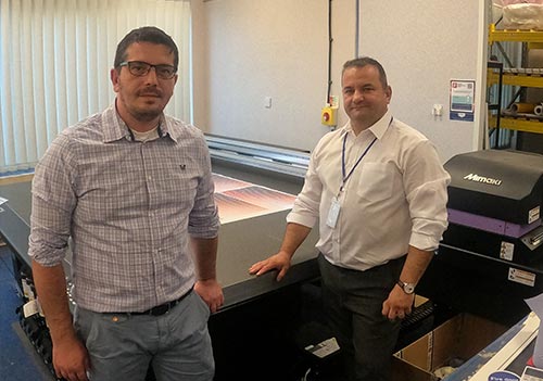 Adrian Cojocaru (L) and Ionel Stefan, founders at Infinite Impressions.