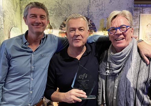 Jon Price and Robin East from CMYUK with Paul Cripps, EFI MD/VP of Sales EMEA and India holding EFI’s biggest revenue generating partner globally award