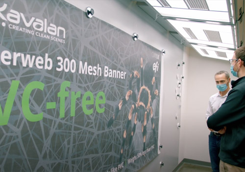 Sean Roberts, Manager, EFI Global Customer Experience Centres with Kavalan Spiderweb 300 Mesh banner at EFI
