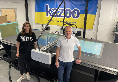 Simon Talbot and Charlotte Smallman from Kazoo Print with a Kongsberg X24 Edge digital cutting table from CMYUK.