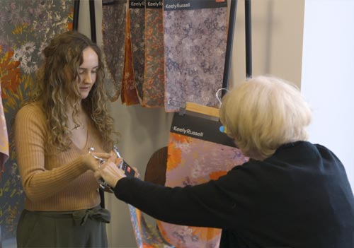 Barbara Chandler photographing and speaking with CIRL Keely Russell