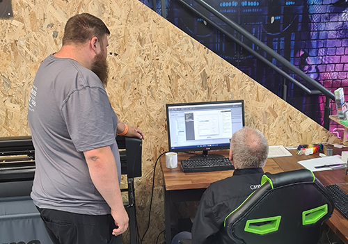 Nettle Chippenham HP operator, Steve Hearne, and CMYUK's Rob Cawston creating custom profiles for the company's HP Latex R1000 PLUS