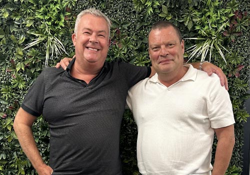 Robin East, Group Chief Commercial Officer at CMYUK, and Bernd-Peter Lautenbach, CEO of PONGS® announce the renewal of their exclusive partnership