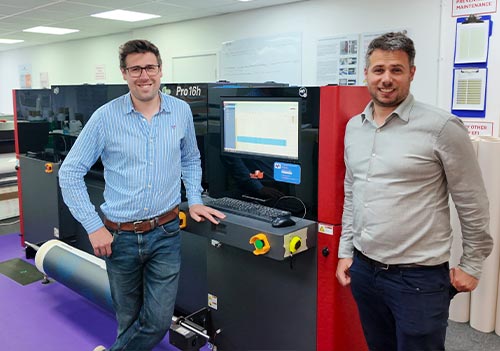 (L) Ross Pike, Operations Director with James Vicefield, Marketing Manager, Quadrant2Design with an EFI Pro 16h  UV LED hybrid printer from CMYUK.