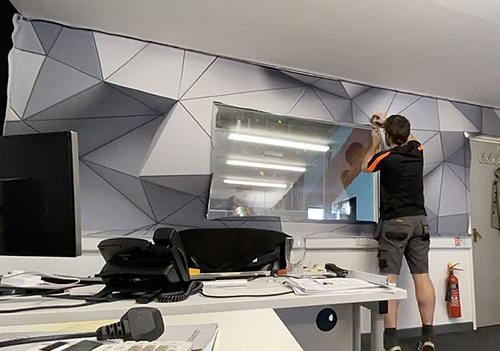 Installation of PONGS® Descor® textile in an office.