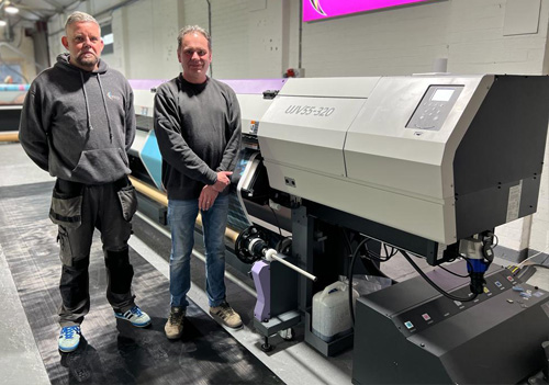 Mark McInyre and Ken Mardon from VMGS with a Mimaki UJV55-320 from CMYUK.